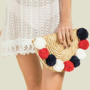 Last one! Shiraleah Kat pom pom straw clutch